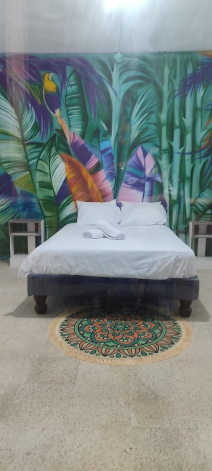 Garden House Puerto Lopez Hotel Екстериор снимка